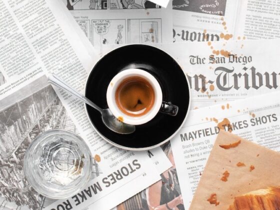 A shot of The WestBean espresso on a pile of San Diego Union Tribune pages